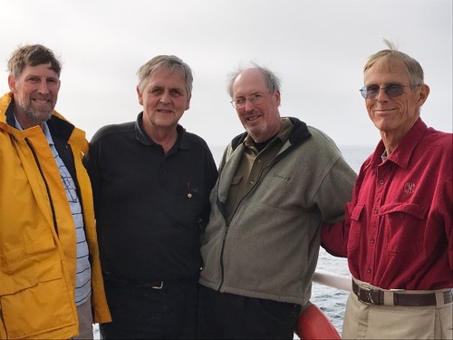 Morrie, Wes and Bobby with the rescue ship's captain