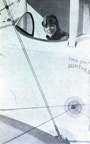 Amelia Earhart in her first training plane.