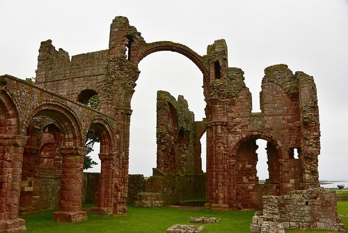 Lindisfarne Priory in Northumbria which was repeatedly raided by Vikings